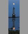The Full Moon just atop the lightroom of
