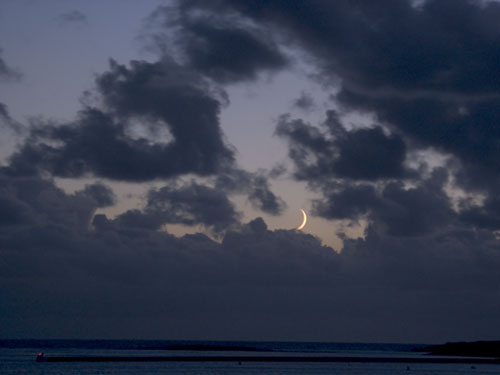 Crescent above the sea