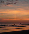 June Sun pillar and fisherman