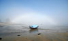 Arc-de-brume sur la mer