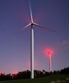 A wind turbine under the stars