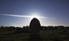 La Lune masque par un menhir de Carnac