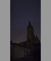 Orion and Taurus above a church