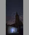 Orion and Taurus above a church