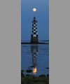 La Pleine Lune à la verticale du phare de la Perdrix